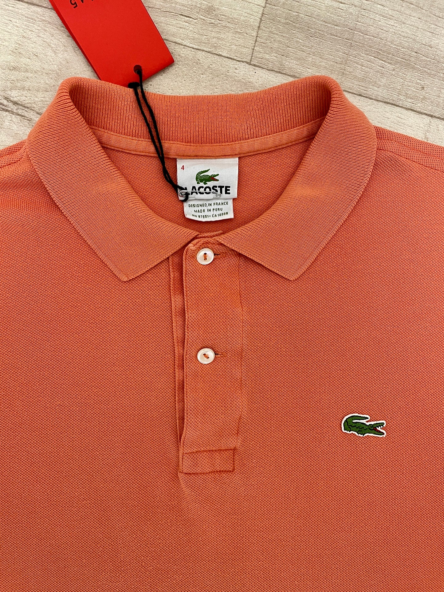 Peach Orange Lacoste polo shirt