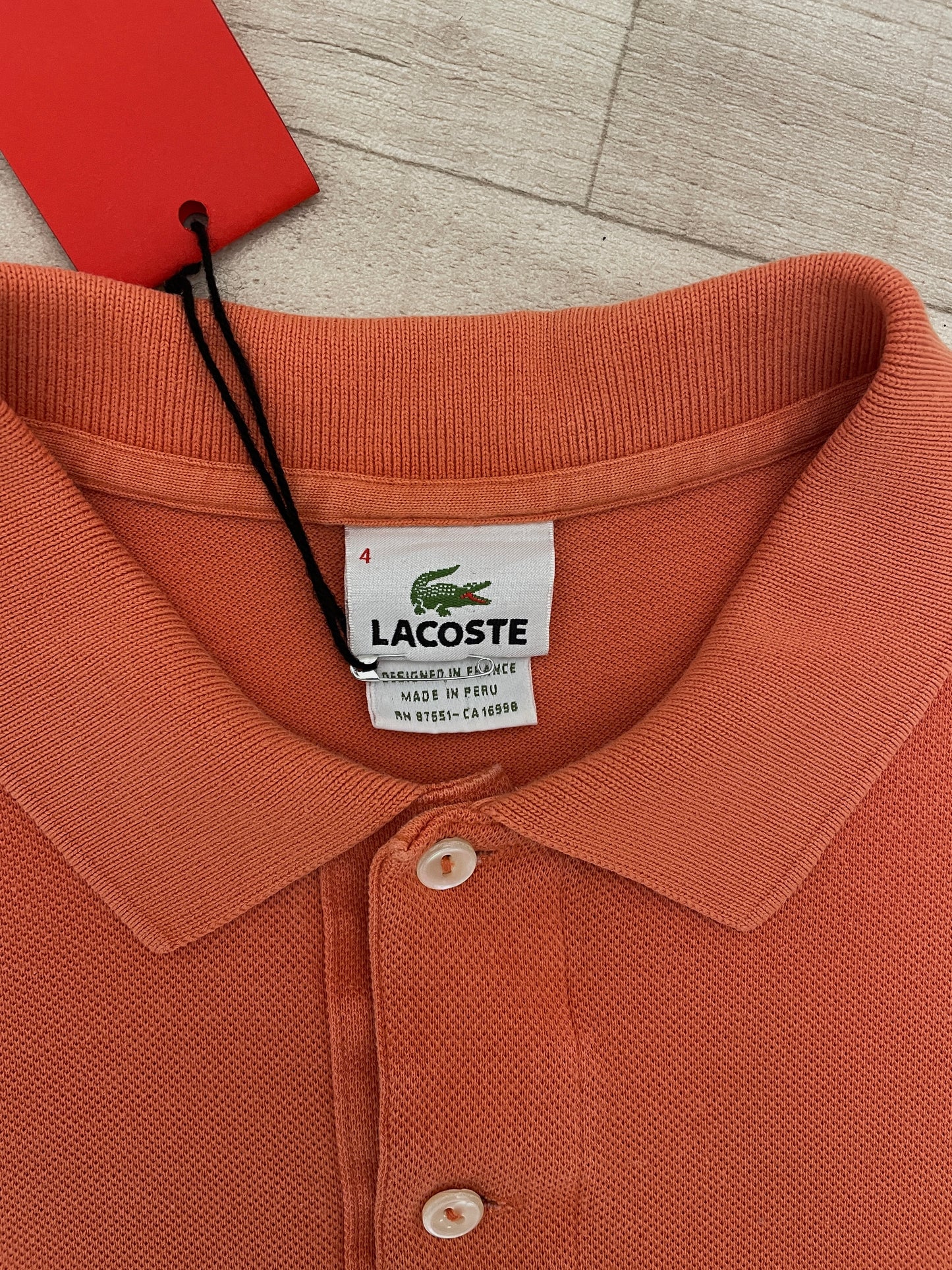 Peach Orange Lacoste polo shirt