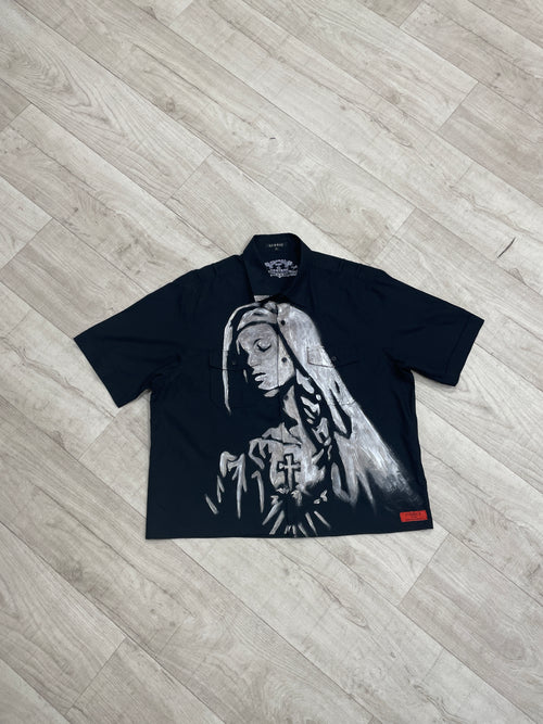 Black shirt with Virgin Mary graphic design
